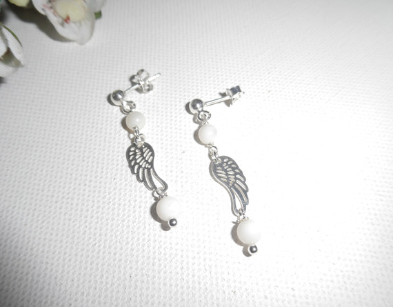 Brincos de mãe de pérolas com asa em 925 tachas de prata