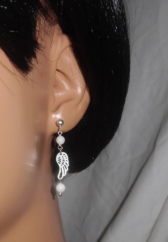 Brincos de mãe de pérolas com asa em 925 tachas de prata