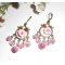 Brincos com pássaros e rosas em travessas de bronze