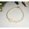 Pérolas e bracelete de rosa em gorgon em bruto sobre fecho de prata