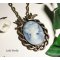 Pingente camafeu azul com pássaros em metal bronze sobre corrente