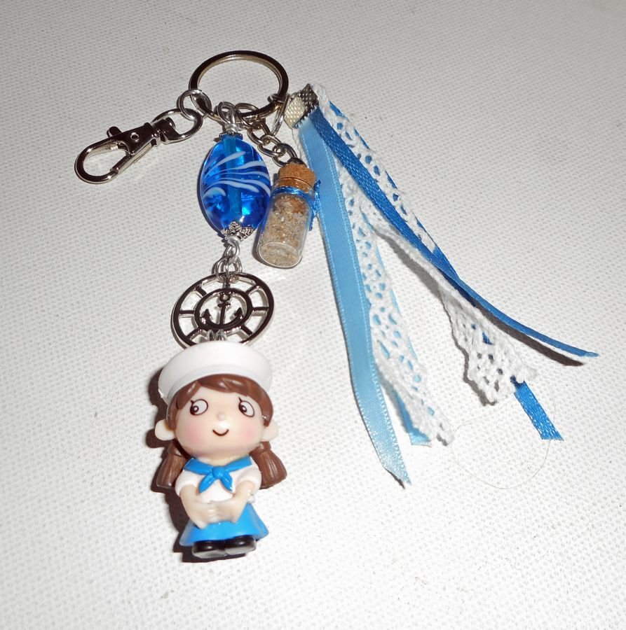 Porta-chaves/jóias em vidro azul e pequeno marinheiro com fitas 