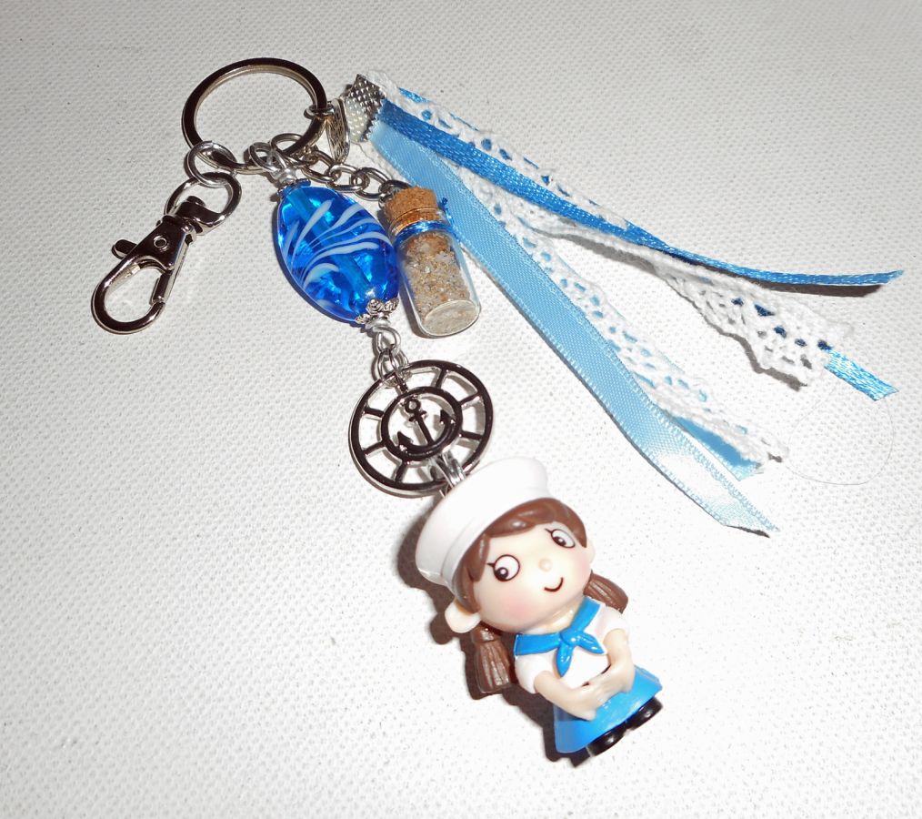 Porta-chaves/jóias em vidro azul e pequeno marinheiro com fitas 