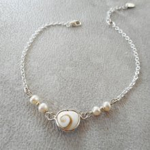 Pulseira de pérolas cultivadas com coração de olho de Santa Lúcia em prata 925