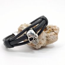 Bracelete de crânio e ossos cruzados em cordas de couro preto