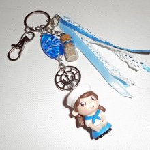 Porta-chaves/jóias em vidro azul e pequeno marinheiro com fitas 